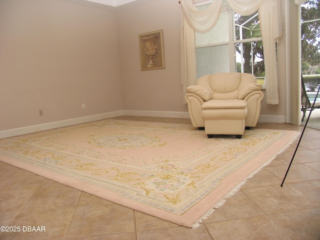 living area with tile patterned flooring