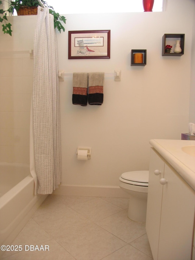 full bathroom featuring tile patterned flooring, vanity, toilet, and shower / bath combo