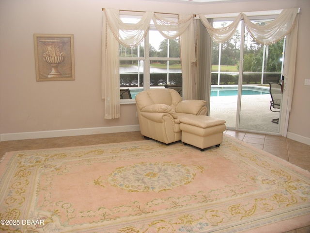 sitting room with tile patterned floors