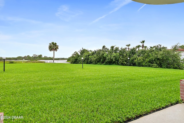 view of yard with a water view