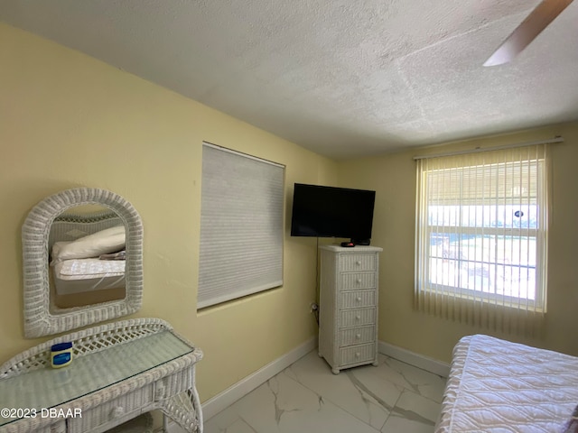 bedroom with a textured ceiling