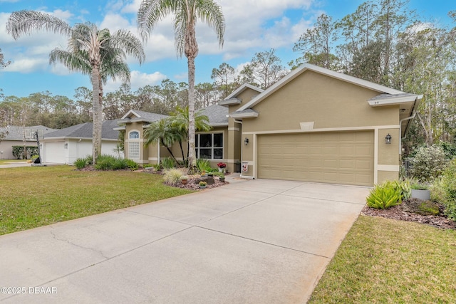 view of front of house with a garage and a front yard