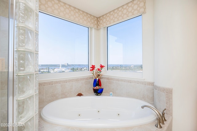 bathroom with tiled tub