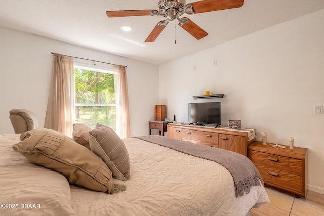 1692 Old Tomoka Rd Unit W, Ormond Beach, FL 32174 - bedroom featuring light tile patterned floors, recessed lighting, ceiling fan, and baseboards