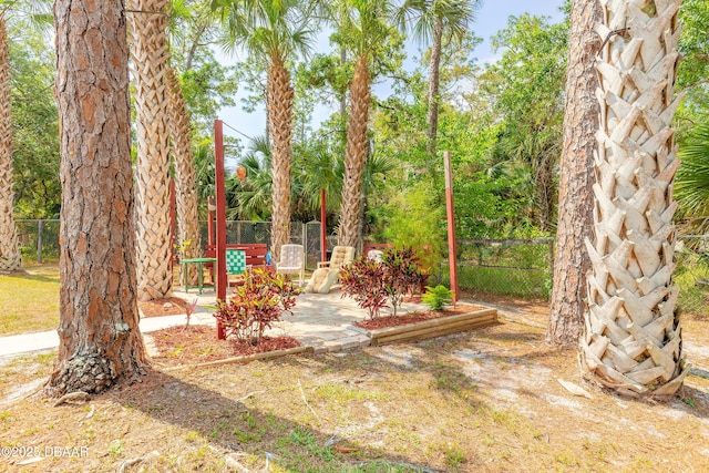 1692 Old Tomoka Rd Unit W, Ormond Beach, FL 32174 - view of yard featuring fence and a patio area