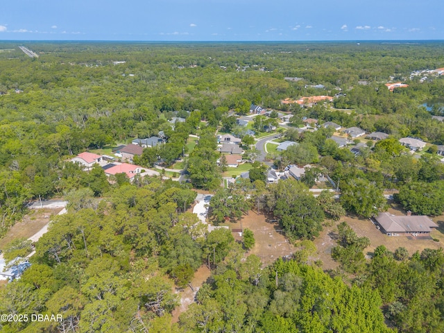 1692 Old Tomoka Rd Unit W, Ormond Beach, FL 32174 - aerial view of property and surrounding area featuring a forest