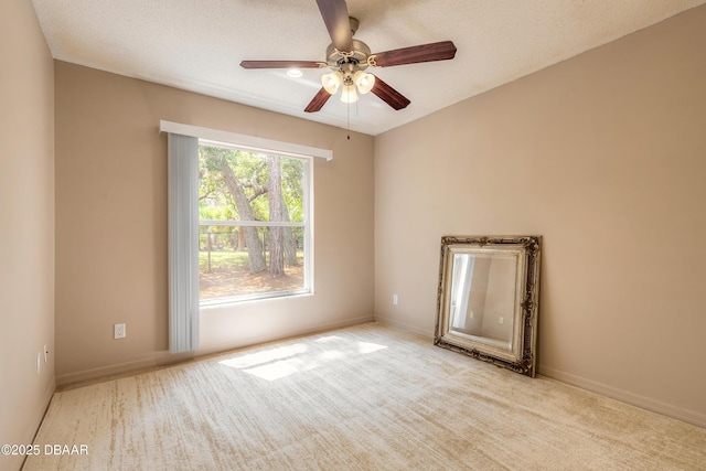 1692 Old Tomoka Rd Unit W, Ormond Beach, FL 32174 - carpeted spare room featuring a ceiling fan and baseboards