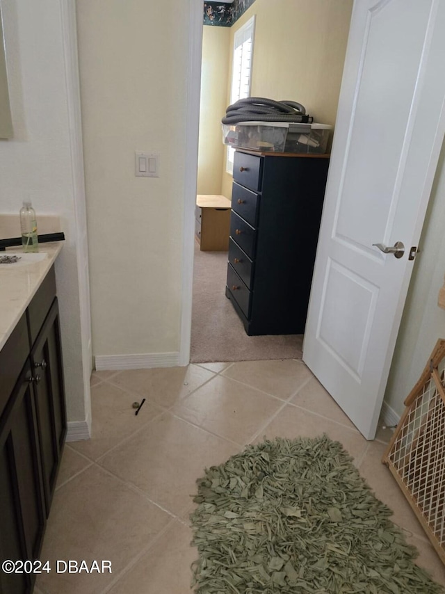 bathroom with vanity and tile patterned flooring