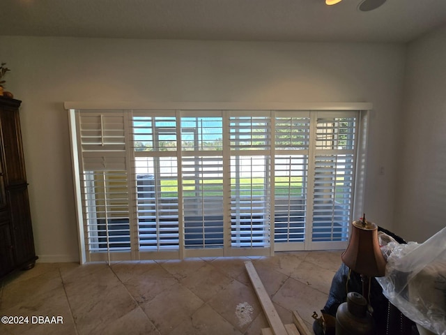 interior space with light tile patterned floors