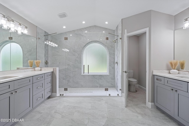 7 Traceway Ct, Ormond Beach, FL 32174 - full bath with marble finish flooring, a stall shower, vanity, lofted ceiling, and recessed lighting