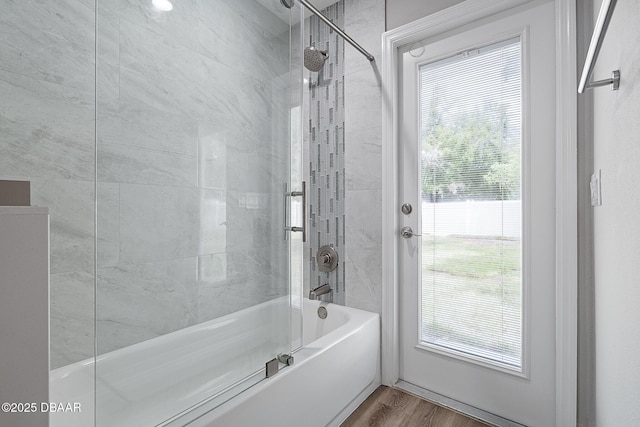 7 Traceway Ct, Ormond Beach, FL 32174 - full bath with tub / shower combination and wood finished floors