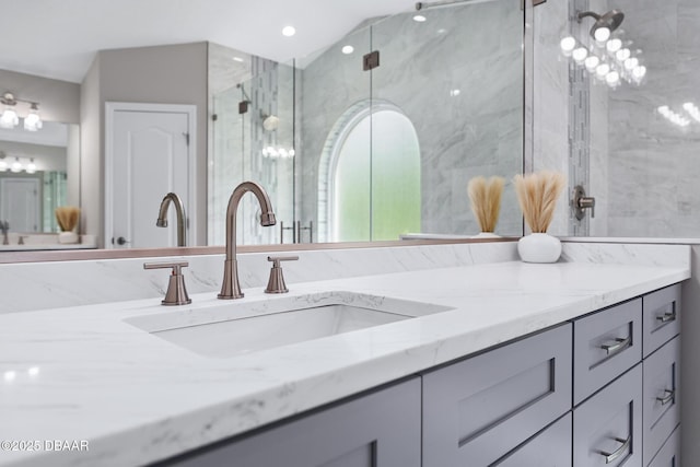 7 Traceway Ct, Ormond Beach, FL 32174 - bathroom with vanity and a marble finish shower