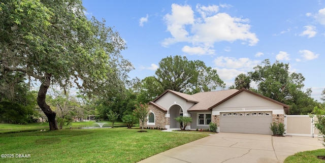 7 Traceway Ct, Ormond Beach, FL 32174 - ranch-style home with an attached garage, driveway, stucco siding, and stone siding
