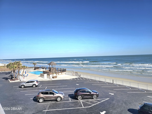 1233 S Atlantic Ave Unit 3310, Daytona Beach, FL 32118 - uncovered parking lot with view of water and beach