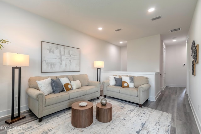 living room with wood-type flooring