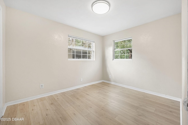 656 Winchester St, Daytona Beach, FL 32114 - unfurnished room with baseboards and wood finished floors
