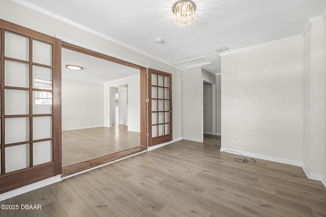 656 Winchester St, Daytona Beach, FL 32114 - unfurnished room featuring baseboards, ornamental molding, wood finished floors, and visible vents