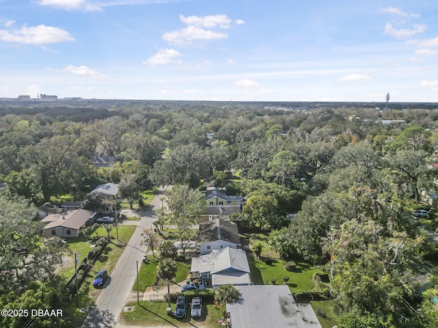656 Winchester St, Daytona Beach, FL 32114 - birds eye view of property featuring a wooded view