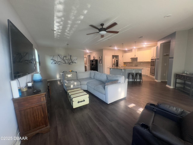 453 Tuscany Chase Dr, Daytona Beach, FL 32117 - living area featuring ceiling fan and dark wood-style floors