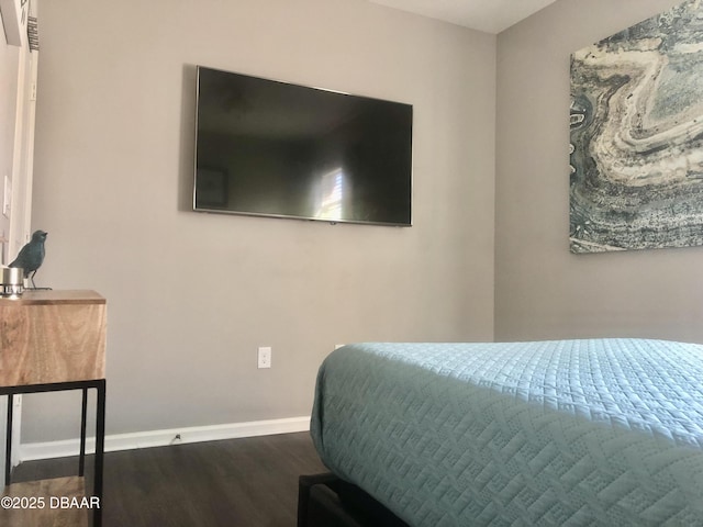 453 Tuscany Chase Dr, Daytona Beach, FL 32117 - bedroom featuring baseboards and wood finished floors