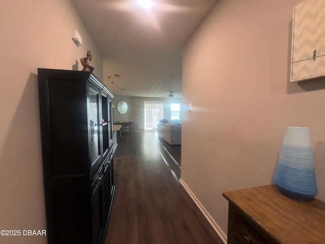 453 Tuscany Chase Dr, Daytona Beach, FL 32117 - hallway featuring baseboards and dark wood finished floors