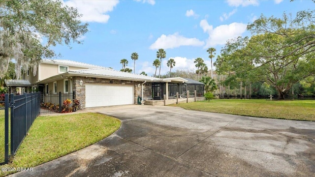 view of front facade featuring a garage and a front yard