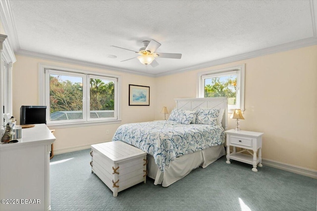 carpeted bedroom with ceiling fan, crown molding, and a textured ceiling