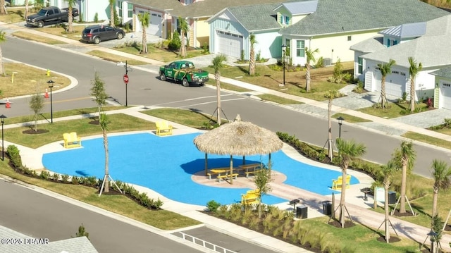 view of pool with a residential view