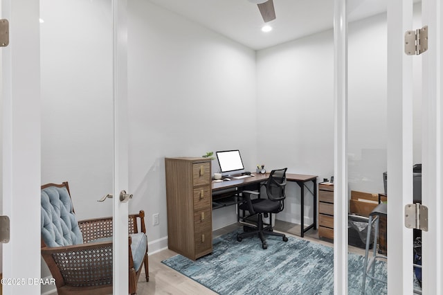 home office featuring ceiling fan, recessed lighting, wood finished floors, and baseboards