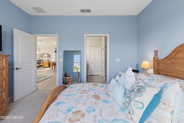 bedroom featuring visible vents and carpet flooring