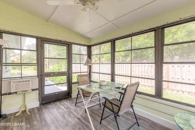 sunroom with ceiling fan, vaulted ceiling, and cooling unit