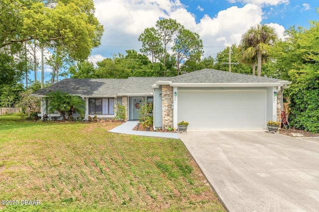 ranch-style house featuring a front lawn and a garage