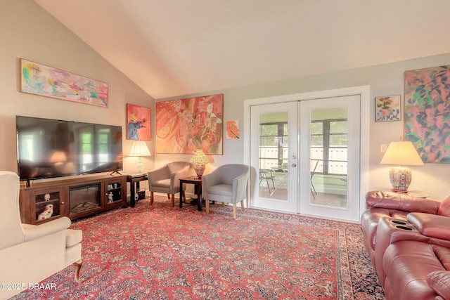 living room with french doors and vaulted ceiling