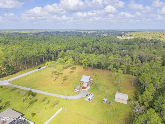 birds eye view of property with a rural view