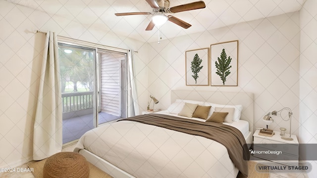 bedroom featuring ceiling fan, access to exterior, and tile walls