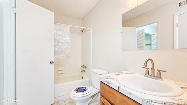 full bathroom featuring tile patterned floors, vanity, toilet, and bathtub / shower combination