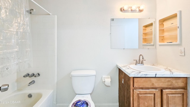 full bathroom featuring vanity, toilet, and shower / bath combination with curtain