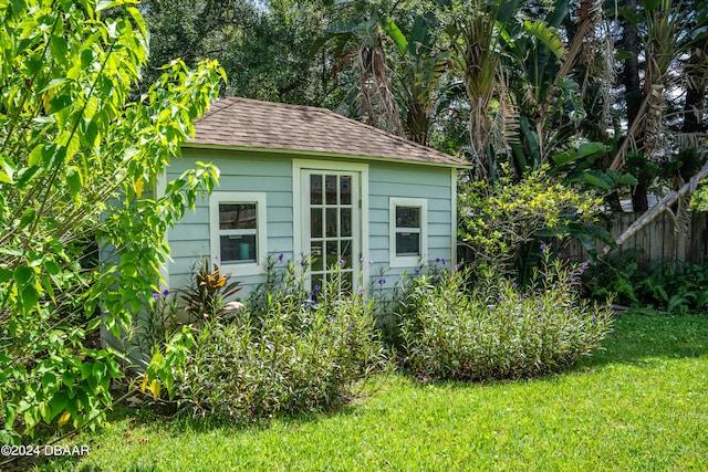 view of outdoor structure featuring a yard