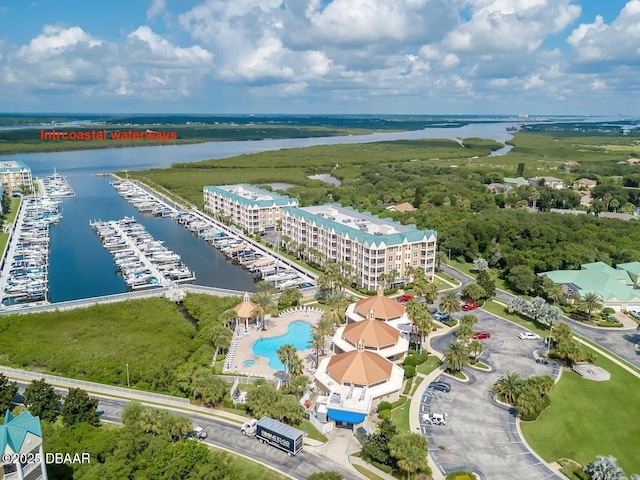 birds eye view of property featuring a water view