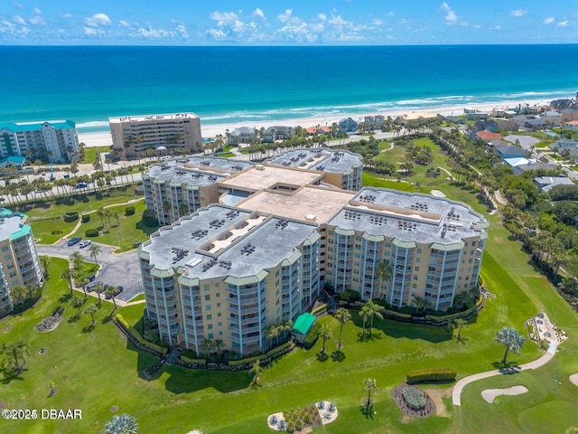 aerial view featuring a water view and a view of the beach