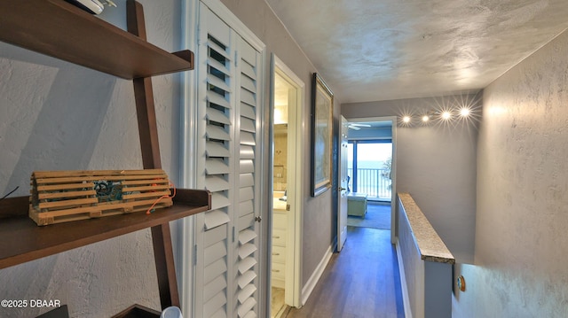 hallway featuring hardwood / wood-style floors