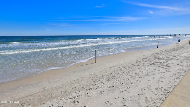 view of water feature with a beach view