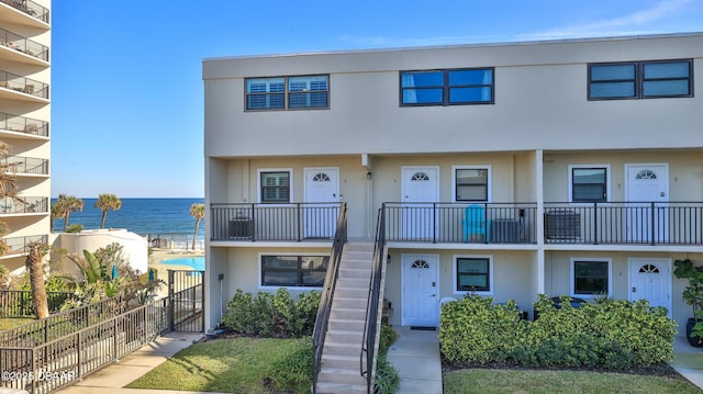 view of front of home featuring a water view