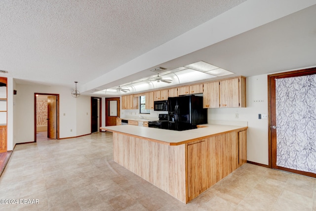 kitchen with black appliances, kitchen peninsula, light brown cabinetry, ceiling fan, and a textured ceiling