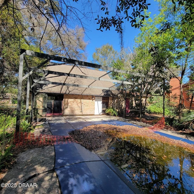 exterior space with brick siding