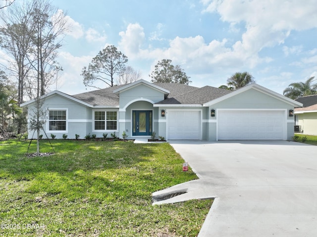 ranch-style house featuring a garage and a front lawn