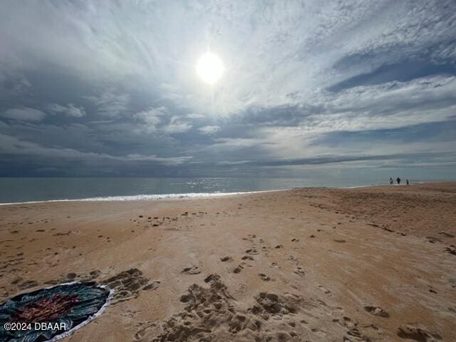 property view of water featuring a view of the beach