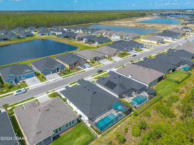 drone / aerial view with a water view