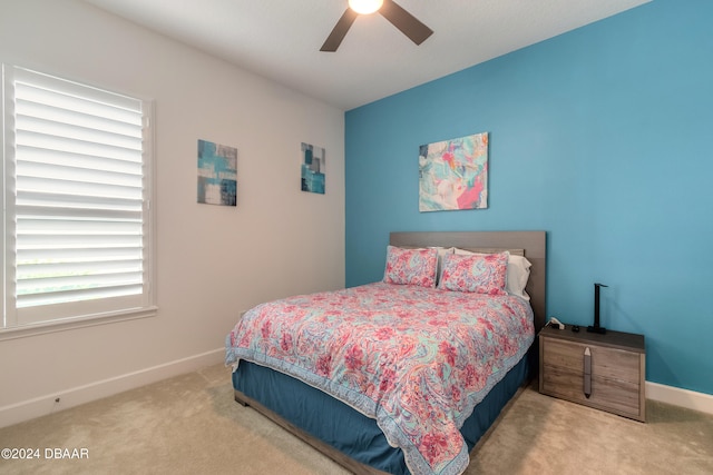 bedroom featuring carpet flooring and ceiling fan