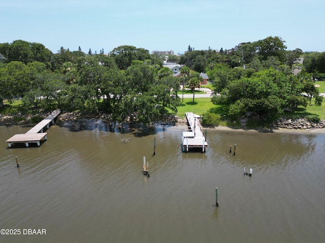 2667 John Anderson Dr, Ormond Beach, FL 32176 - dock featuring a water view and view of wooded area